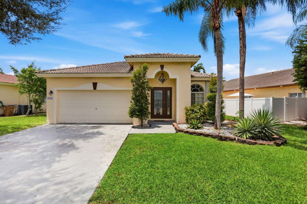 Photo of 1343 SW 44TH Terrace, Deerfield Beach, FL 33442 (MLS # B26061671)
