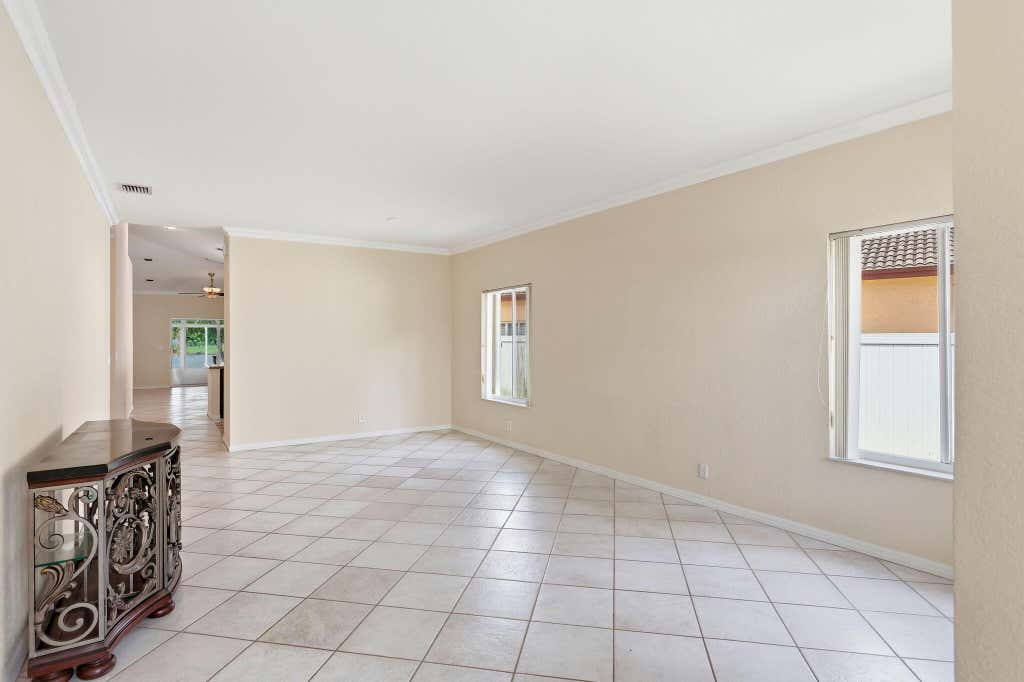 Photo of 1343 SW 44TH Terrace, Deerfield Beach, FL 33442 (MLS # B26061671)