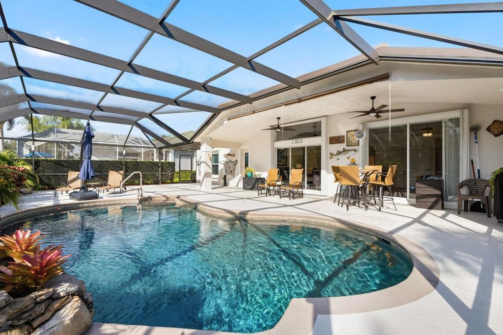 Photo of 5196 SW Hammock Creek Drive, Palm City, FL 34990 (MLS # R11152826)