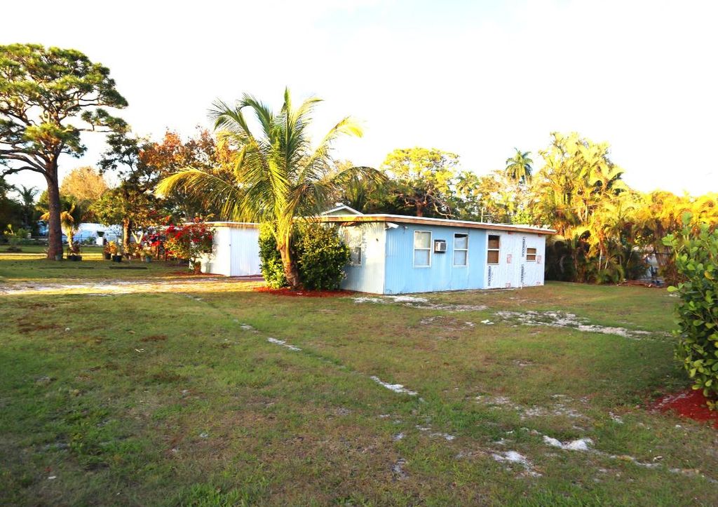 Photo of 5035 SE Horizon Avenue, Stuart, FL 34997 (MLS # R11157453)