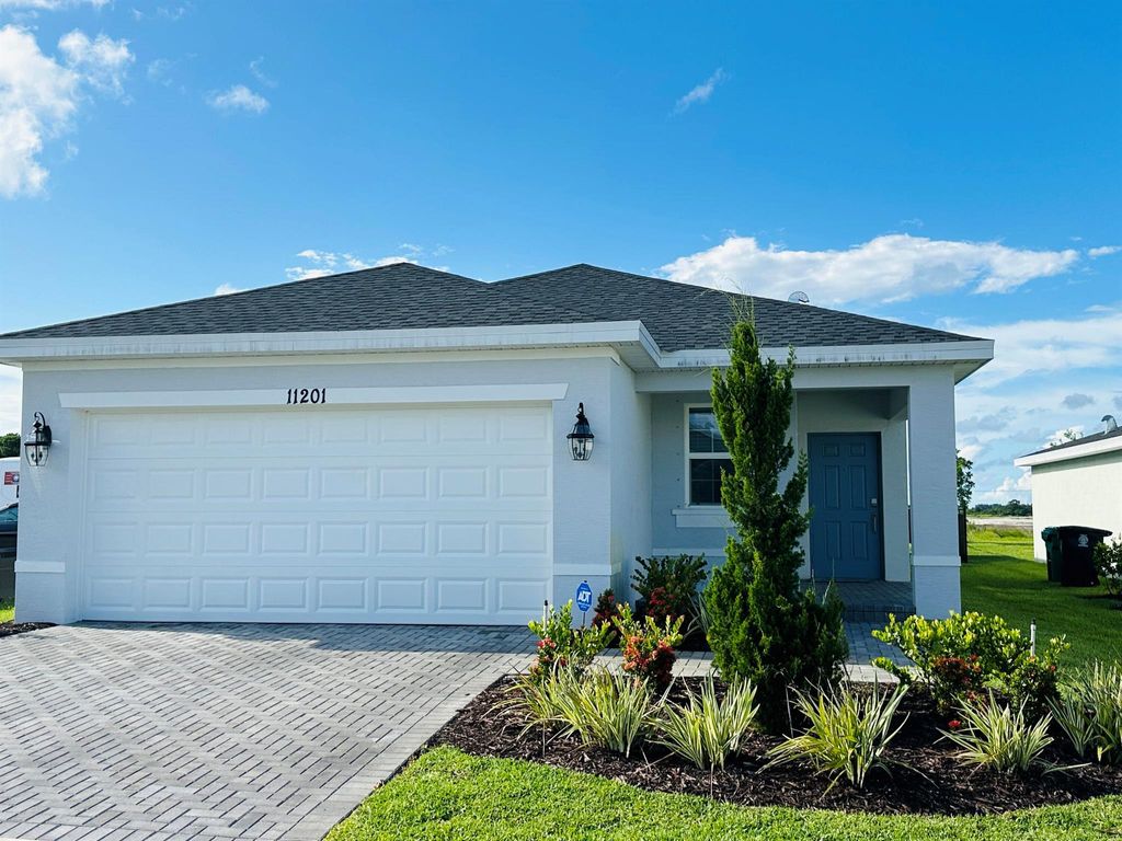 Photo of 11201 NW Fernbrook Drive, Port Saint Lucie, FL 34987 (MLS # R11104216)