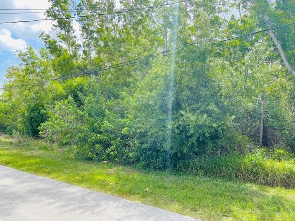 Photo of 5793 NW Coosa Drive, Port Saint Lucie, FL 34986 (MLS # R10717687)