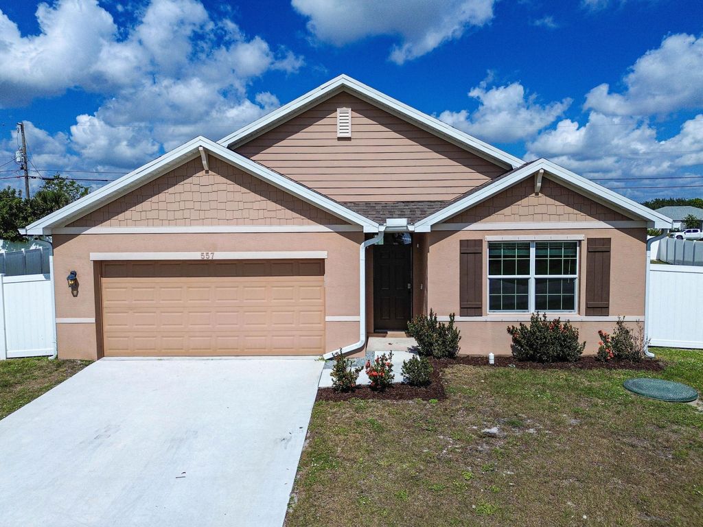 Photo of 557 SW Columbus Drive, Port Saint Lucie, FL 34953 (MLS # B26023547)