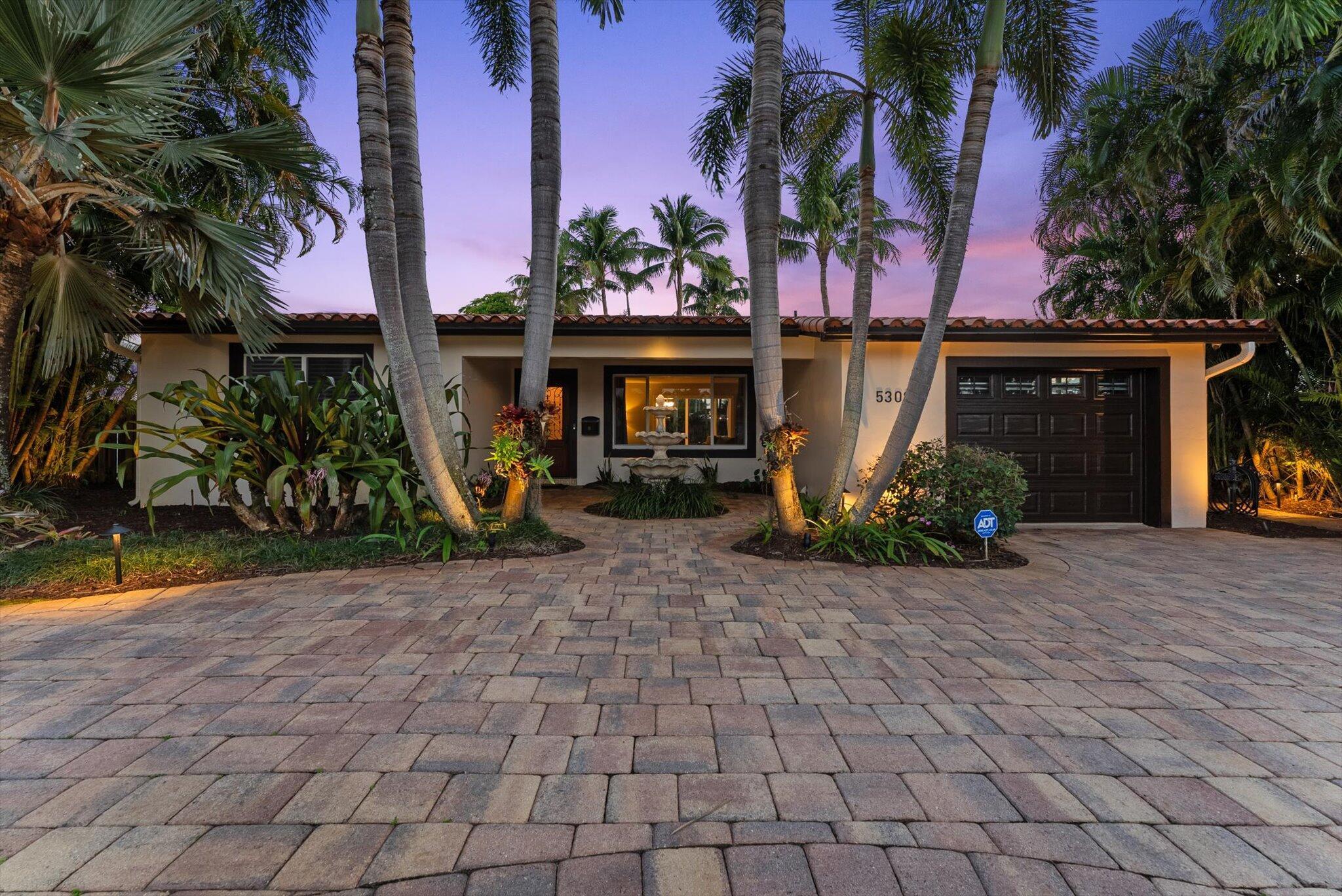 AMAZING OPPORTUNITY! Tropical Paradise awaits you at this one-of-a-kind Oasis pool home in Hollywood Hills! The sprawling oversize lot features lush greenery with an abondance of gorgeous palms, large-leafy plants & vibrant flowers, perfectly blending natural surroundings - creating an atmosphere of relaxation and serenity. The home has been meticulously maintained, while remaining constant with its ability to capture timeless beauty and purest form of living. Natural light pours into the kitchen & living areas through the large Impact Glass Doors and Windows. If you do ever get the urge to leave home there is no shortage of nearby convenience and things to do. The famous Hard Rock Guitar Hotel & Casino is just 10min North and the Beach / Hollywood Boardwalk is 15 minutes East!