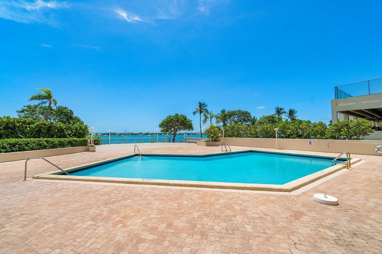 Waterfront Paradise! Beautifully renovated 2BR/2BA condo directly on the Intracoastal with a private white sand beach, fishing dock, and rare opportunity to moor your boat on-site. Enjoy stunning water views, modern finishes, and the ultimate Florida lifestyle.
