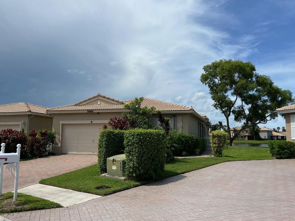 Photo of 8593 Mangrove Cay, West Palm Beach, FL 33411 (MLS # R11005612)