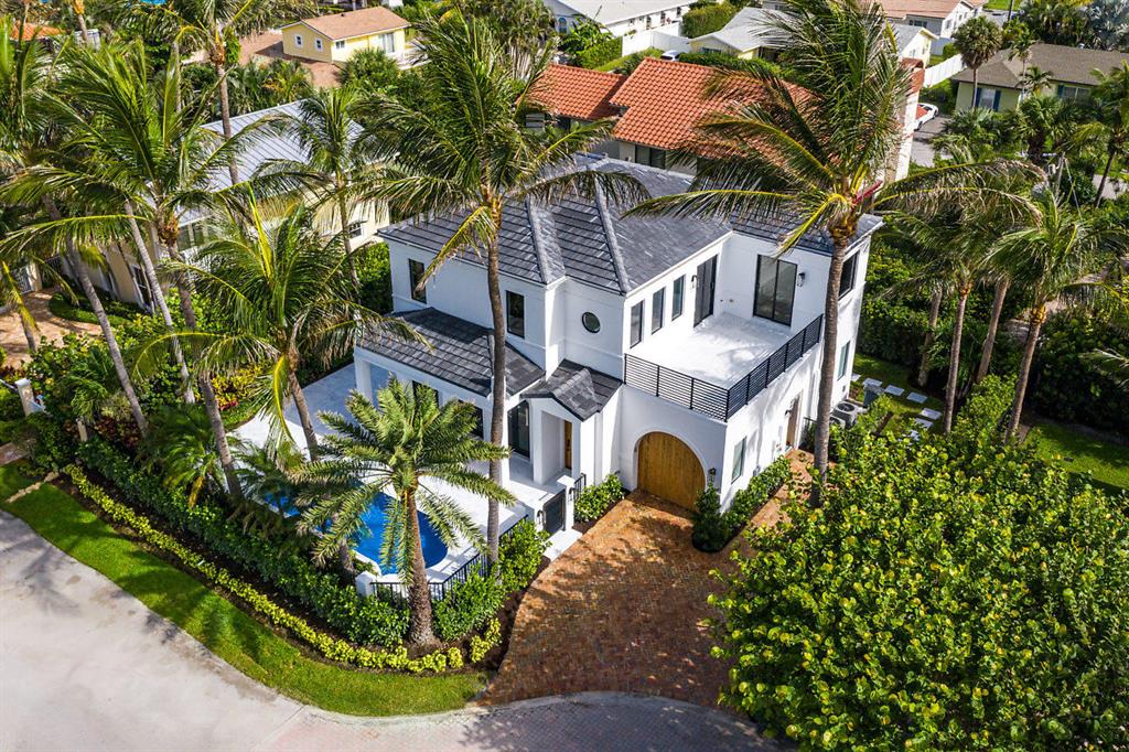 Newly renovated July 2020 Randall Stofft designed beach home located in the highly desirable Ocean Ridge community. This east of AIA, ''walk to beach'' home with private beach access. This classic contemporary home has been totally renovated to include new roof, windows, kitchen, bathrooms, custom staircase, custom closets, flooring, exterior stucco, pool, pool deck, pool heater, central vac system, COVID 19 HVAC cleaning and much, much more. This home offers an amazing master suite on the main with the full spa like experience. The Real Estate and Renovation team at NuConcept Properties has delivered an amazing transformation to this home.