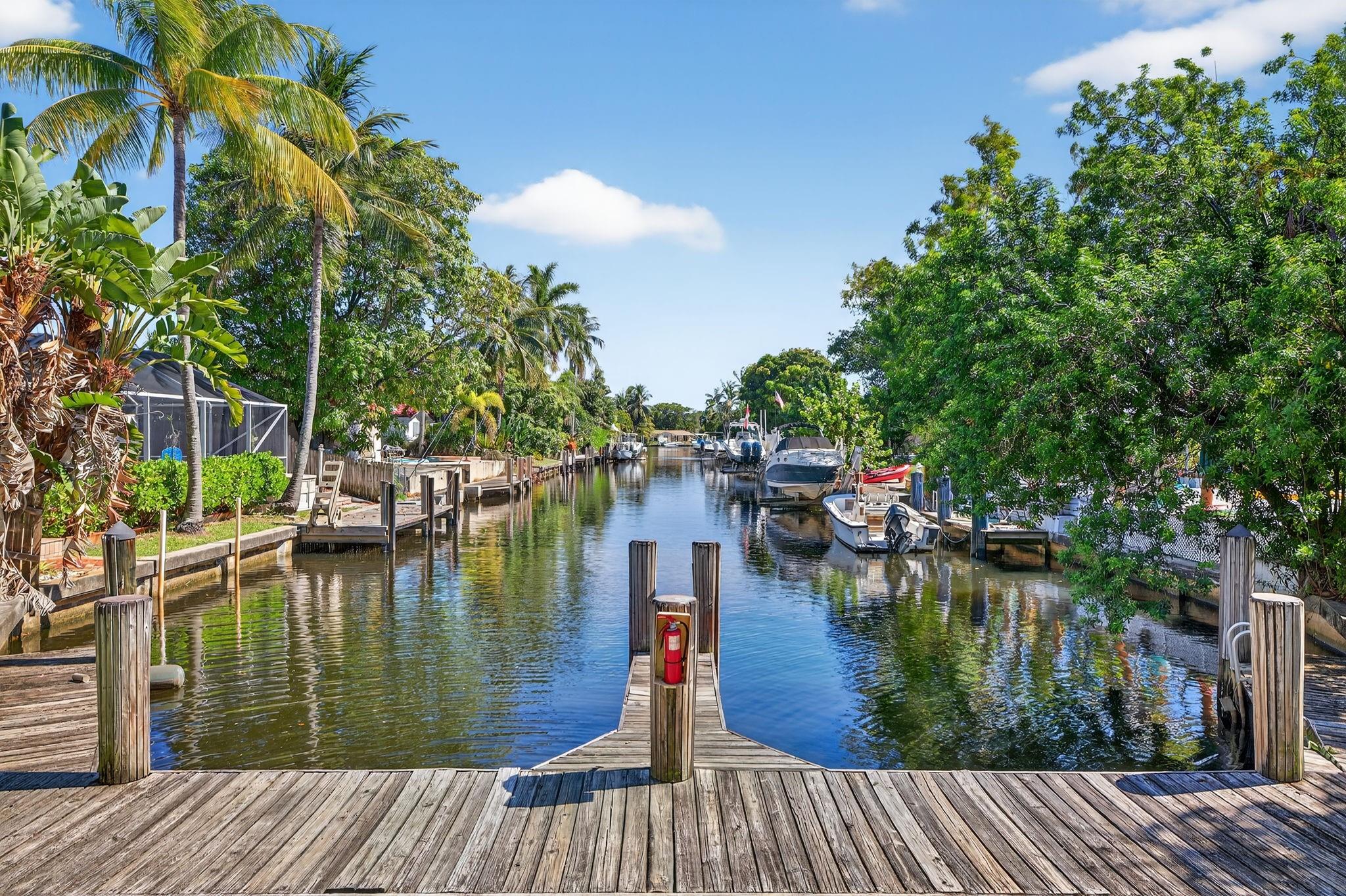 Waterfront 2BR Condo for Rent in Boutique Pompano Beach Community — Available Now
Move-in ready, ground-floor corner unit with serene canal views and a calm, inviting atmosphere. This bright, open 2-bedroom, 1-bathroom condo features ceramic tile throughout and a kitchen renovated in 2023 with new cabinets, quartz countertops, and stainless appliances.
Enjoy the boat dock, with dockage available for boats up to 25'. The ocean-access canal offers fixed bridges with a minimum 6' low-tide clearance. The gated community includes two parking spaces, on-site laundry, a courtyard, and an on-site pool, plus easy access to local services and attractions.
Ready to start your coastal lifestyle? Contact us to schedule a viewing.