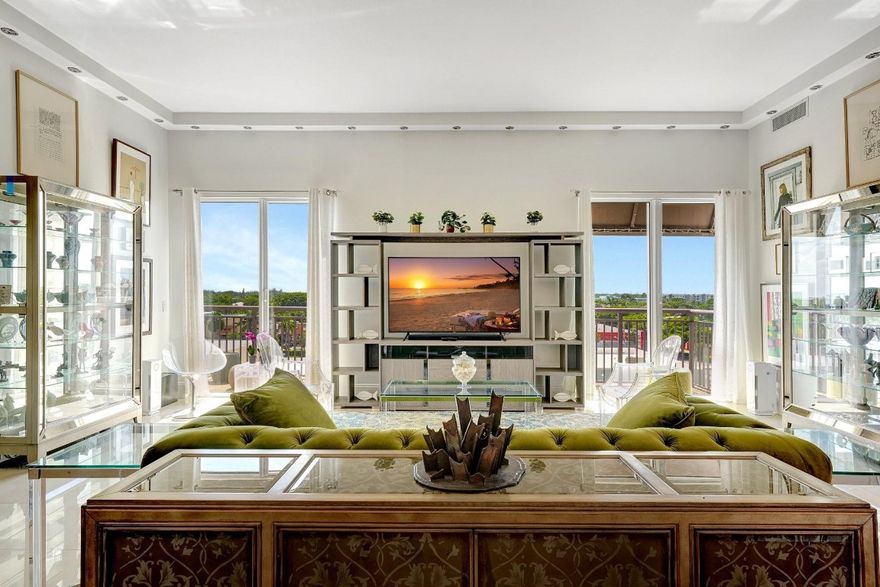 Spanning just under 2000 square feet with soaring 11-foot ceilings, this stunning residence offers two primary suites each with its own private bathroom complete with jacuzzi tub. The spaciousness extends tothe four newly refinished balconies where you can indulge in views of the sunset. Enjoy resort-style amenities: sprawling pool with waterfall, two hot tubs, two story workout center, movie theater, billiards room,library, and indoor/outdoor kitchens for hosting gatherings with ease. You'll find yourself steps away from top-ratedrestaurants & essential shopping, making it effortless to enjoy this lively atmosphere. Condo has reserves! Comes with a climate controlled storage unit and underground parking spot right off the elevator.