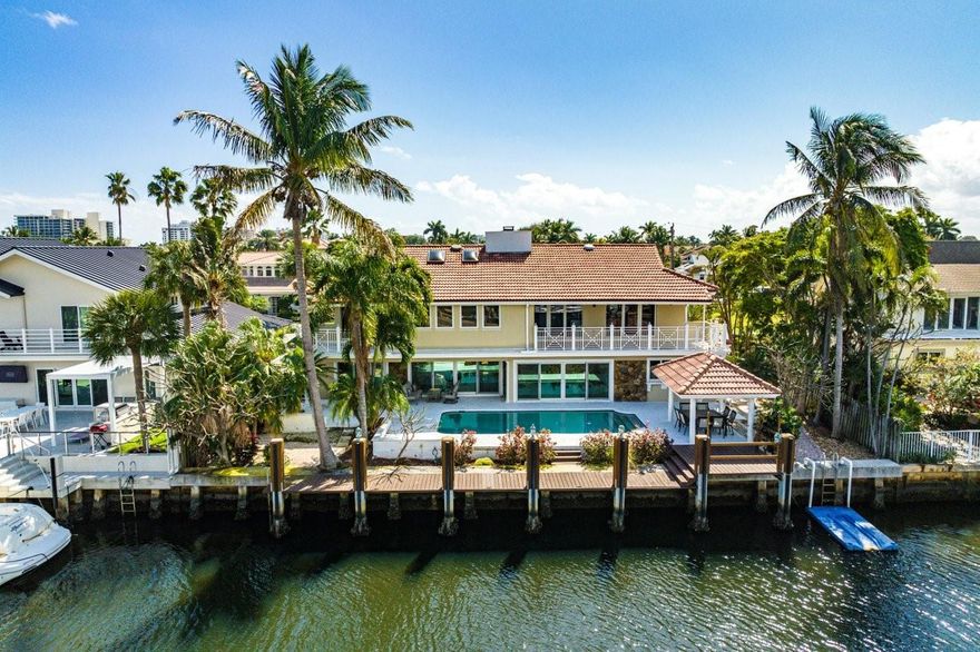 Amazing waterfront home located on the widest deep water canal in highly desirable Tropic Isle. This 4 bed 3.5 bath,
 pool home offers a 60' private dock perched on 90' of waterfront, easy access to Intracoastal & Ocean. Ceiling to
 floor stone fireplace, courtyard entrance, full impact windows and doors, 2 car gar, circular drive and downstairs
 master suite, . Very close to inlets as well as popular boating and fishing spots. Minutes to downtown Delray and
 Boca Raton. Property has undergone extensive improvements. including fresh landscaping for a clean look, updated
 lighting, a fresh color palette inside & out, New Pool pump & equipment, irrigation system and much more! This is a
 must see! Will also Rent, please enquire witin.