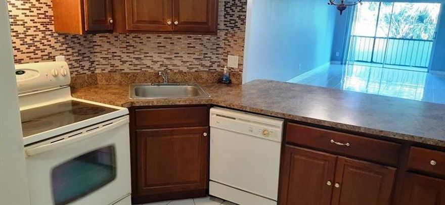 BEAUTIFUL 2 BED 2 BATH LOCATED IN GARDEN OF INVERRARY. WELL KEPT UNIT ON THE FIRST FLOOR. ENJOY THE UPGRADED KITCHEN, WOOD AND TILED FLOORS. CLOSE TO OAKLAND PARK BLVD & TURNPIKE. LOW HOA FEE.