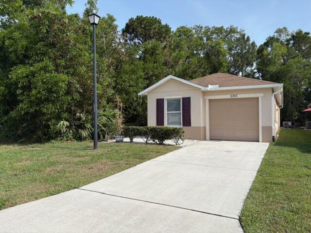 Photo of 5315 NW Pine Trail Circle, Port Saint Lucie, FL 34983 (MLS # R11091838)