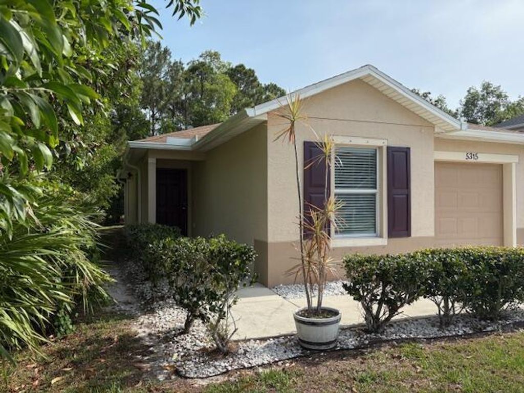 Photo of 5315 NW Pine Trail Circle, Port Saint Lucie, FL 34983 (MLS # R11091838)