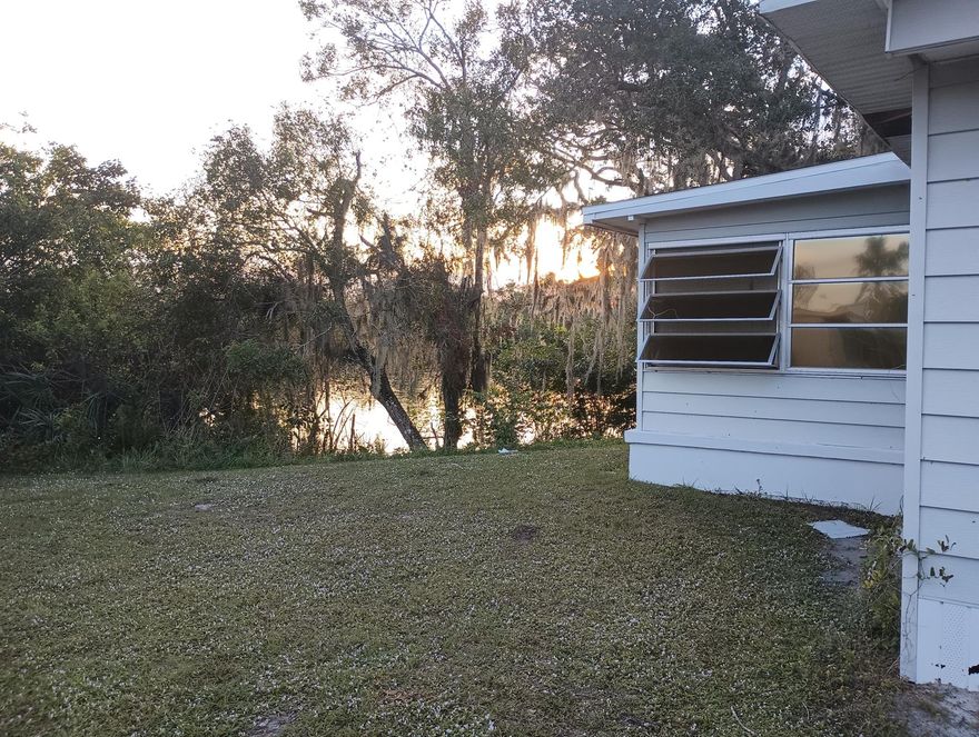 THE best lot in all of Spanish Lakes Home is vacant due to health reasons Perfect fishing and crabbing spot 20 ft from the back door. NO BODY HAS FISHED THIS SPOT IN 10 YEARS Very private large trees and foliage protects your private beach. The home is currently occupied but needs some more work to make perfect. Owner has been improving the exterior and interior. The home passed the exterior inspection last month.Market rent (new owner): $1,483.06 a month for 12 months. You just have to rent the land from Spanish Lakes  This is a million-dollar location. Neighbors have put in white PVC 4 inch posts and anchored long term in the ST Lucie River