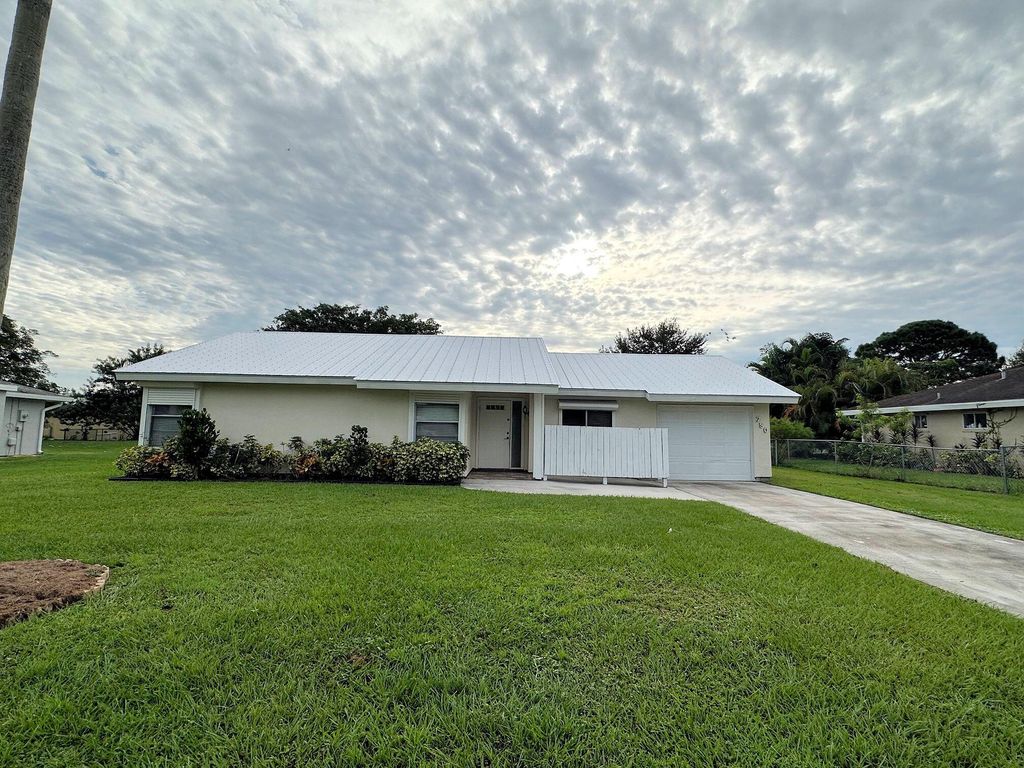 Photo of 750 SW Belmont Circle, Port St Lucie, FL 34953 (MLS # R10902909)
