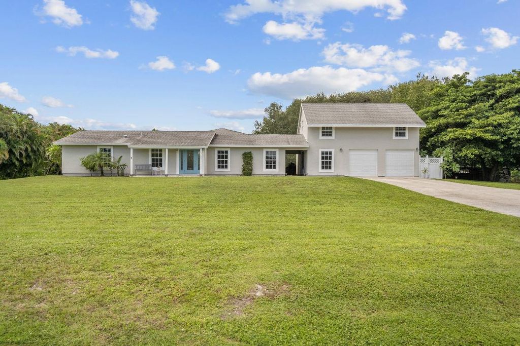 Photo of 16185 72nd Drive N, Palm Beach Gardens, FL 33418 (MLS # R11125208)