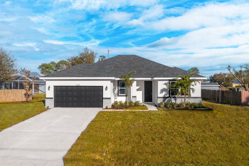 Photo of 951 SW Gaitor Avenue, Port Saint Lucie, FL 34953 (MLS # R10932315)