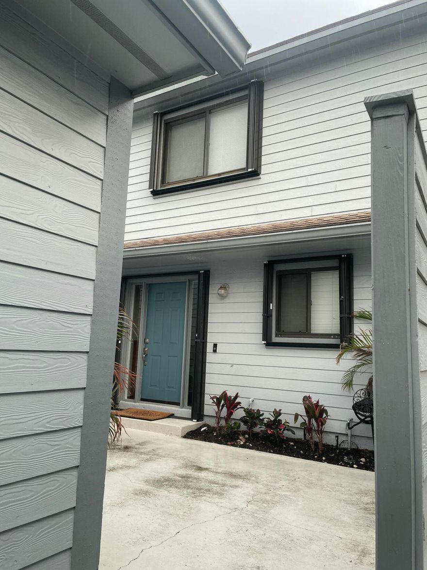 Pride of ownership shows in this pristine 2 bedroom 2.5 bath townhome located in Georgetown at Heritage Ridge.  Recent upgrades include, new  hardwood floors, new carpet, accordion hurricane shutters.  Oversized garage with pull down stairs & attic storage. Entry courtyard area plus enclosed rear lanai with impact glass giving living room additional square footage. A covered balcony off the master bedroom offers lovely garden views. Community offers 2 pools, spa/hot tub, tennis, Pickleball & public golf course.