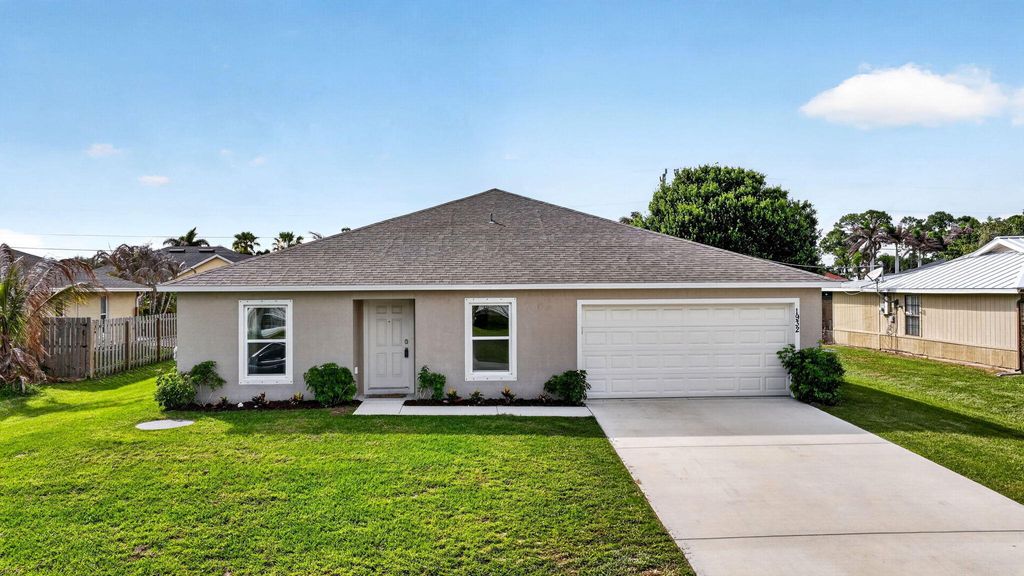 Photo of 1932 SW Lennox Street, Port Saint Lucie, FL 34953 (MLS # B26019904)