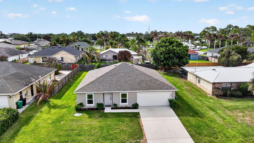 Photo of 1932 SW Lennox Street, Port Saint Lucie, FL 34953 (MLS # B26019904)
