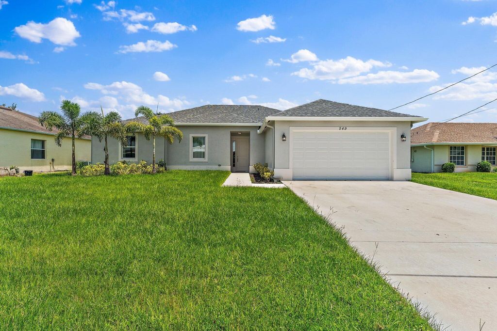 Photo of 549 SW Feldman Avenue, Port St Lucie, FL 34953 (MLS # R10903881)