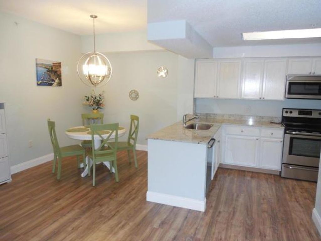 Photo of 3022 Alcazar Place #205, Palm Beach Gardens, FL 33410 (MLS # R11123024)