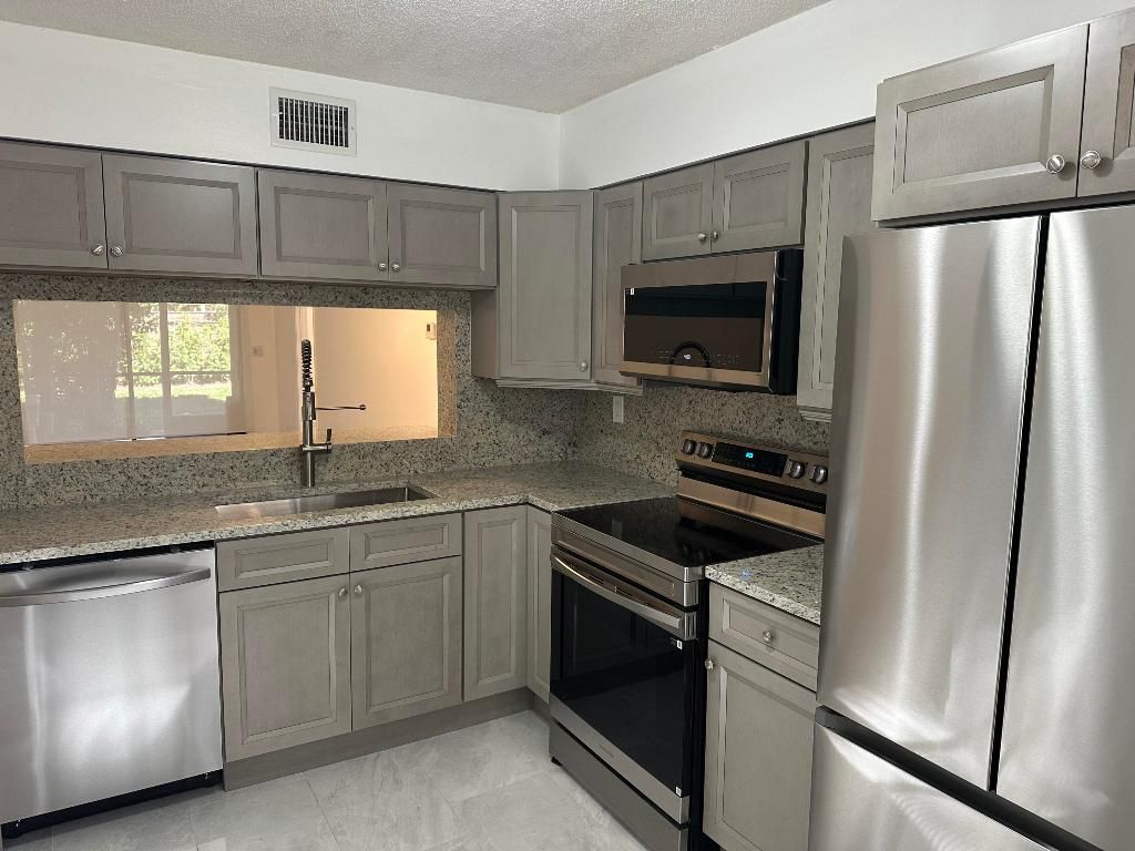 Photo of 3130 Millwood Terrace #1130, Boca Raton, FL 33431 (MLS # R11157100)