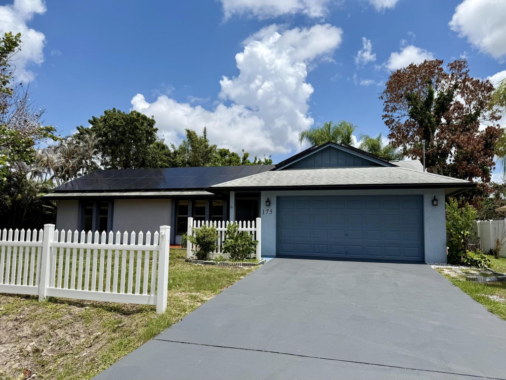 Photo of 175 SW Oakridge Drive, Port Saint Lucie, FL 34984 (MLS # B26033164)