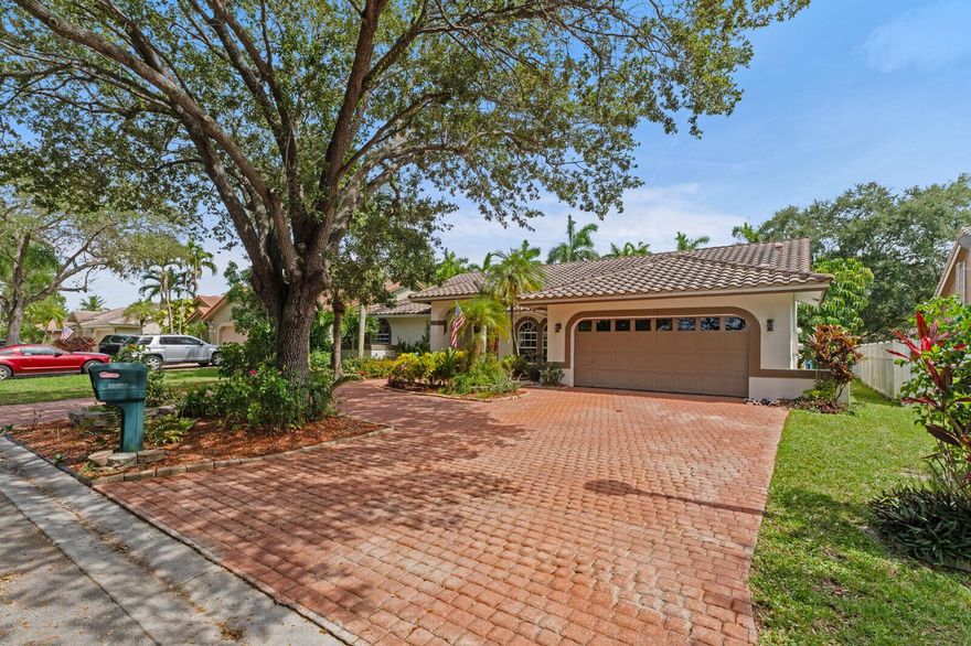 Exceptional value in Brookside - recently reduced! Rare opportunity in the heart of Brookside! This 4BR/3BA pool home sits on an expansive 10,000+ sq ft lot with a low $52/mo HOA, no approval process, and zoning for A+ schools including Stoneman Douglas. Features a triple-split floor plan with spacious living/dining, generous primary suite with dual closets & patio access, and a kitchen with custom oversized eat-in counter. Outside: private backyard oasis with resurfaced dark-finish pool, open patio, and circular paver driveway for great curb appeal & parking. Barrel tile roof 2015. Move-in ready with potential to customize!