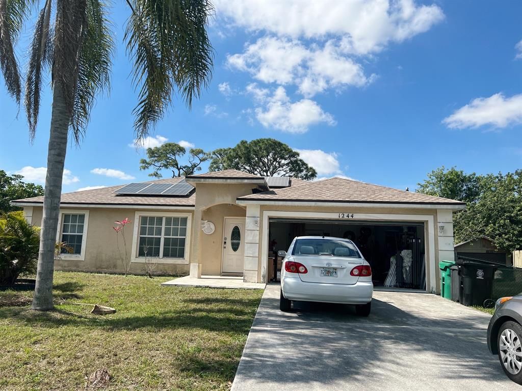 Photo of 1244 SE Naples Lane, Port St Lucie, FL 34983 (MLS # R10871548)