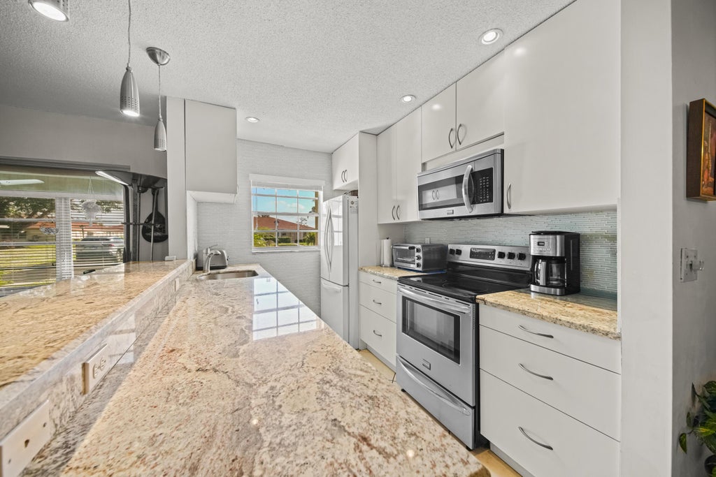 Photo of 4875 NW 3rd Court #C, Delray Beach, FL 33445 (MLS # R11145661)
