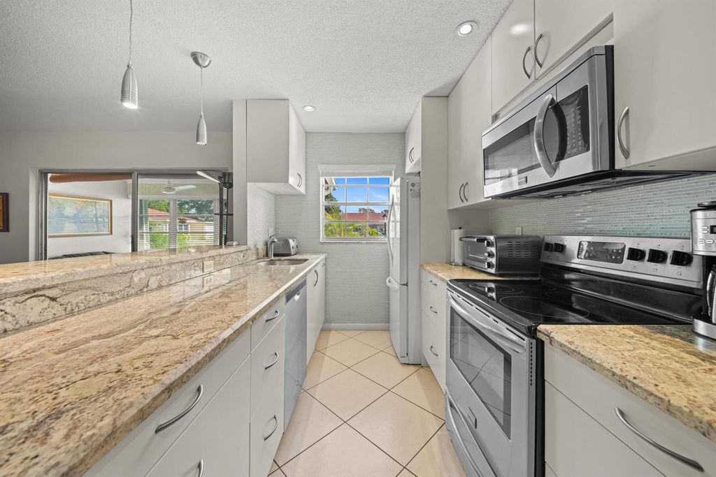 Photo of 4875 NW 3rd Court #C, Delray Beach, FL 33445 (MLS # R11145661)