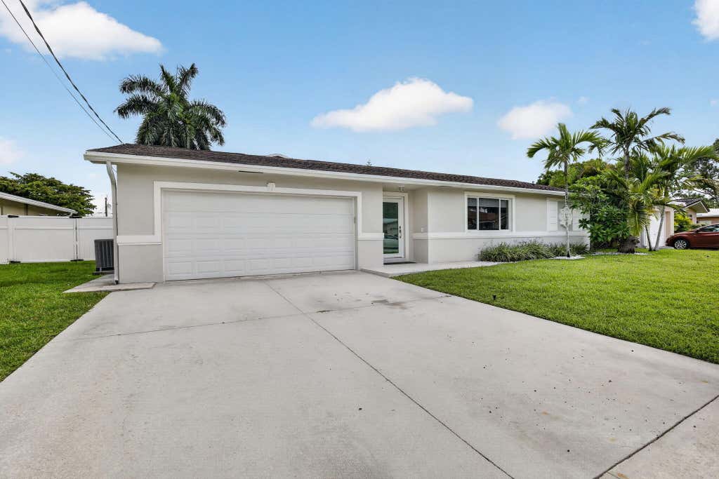 Photo of 12411 SW 2nd Street, Plantation, FL 33325 (MLS # B26035789)