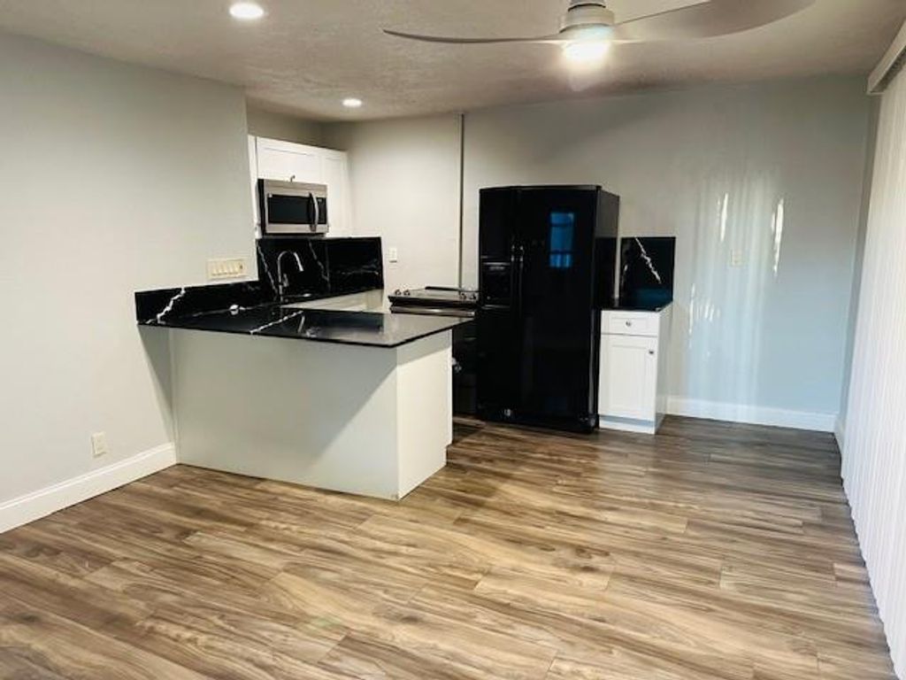 Photo of 3593 NW Elizabeth Street #B, Palm Springs, FL 33461 (MLS # F10477305)