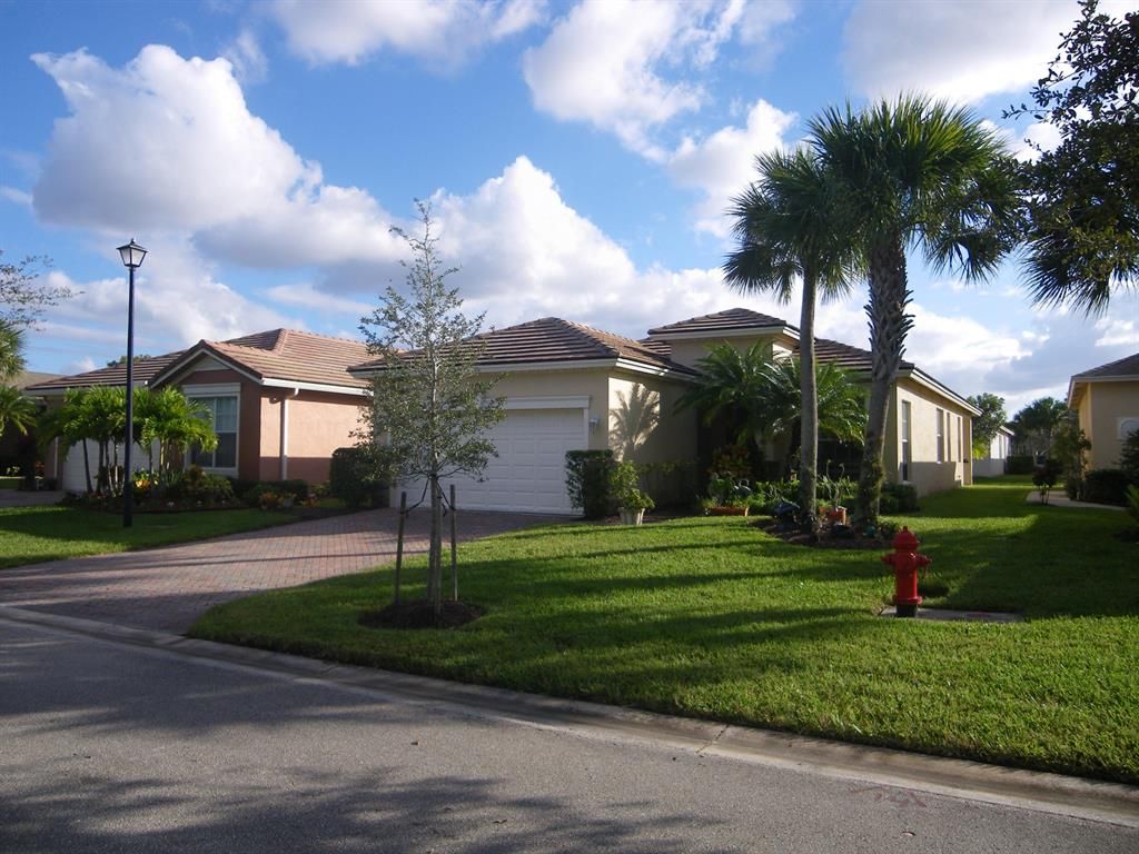 Photo of 10075 SW Brookgreen Drive Dr, Port St Lucie, FL 34987 (MLS # R10673660)