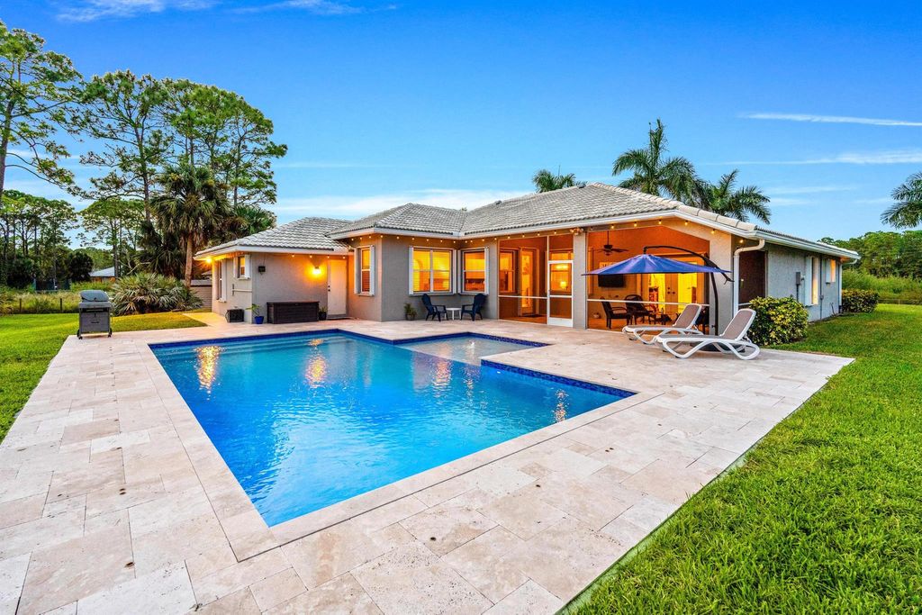 Photo of 15632 69 Court N, The Acreage, FL 33470 (MLS # R11099785)