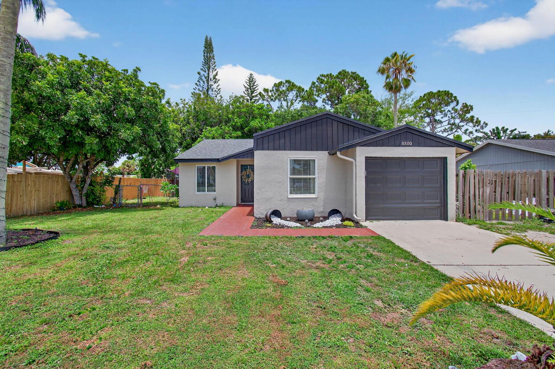 Beautifully updated, open concept 3BR/2BA home showcases a versatile split-bedroom layout in a quiet all ages community with LOW HOA! This light-filled home features vaulted ceilings, 2021 ROOF, 2024 A/C, 2024 Titan Tankless WH and 2021 plank tile flooring throughout. Enjoy 1,664sqft of living space which includes a large enclosed Florida Room plus a flexible bonus room--perfect as a 4th bedroom, office, or playroom. The spacious eat-in Kitchen boasts Quartz countertops, large center island with deep stainless steel sink, 2021 LG Appliances, 42'' white Euro-style cabinetry and subway tile backsplash. The Primary Suite is beautifully updated with Crown Molding, new flooring, and an ensuite bath with a shiplap accent wall and floor-to-ceiling tiled shower. The Guest Bath is also updated