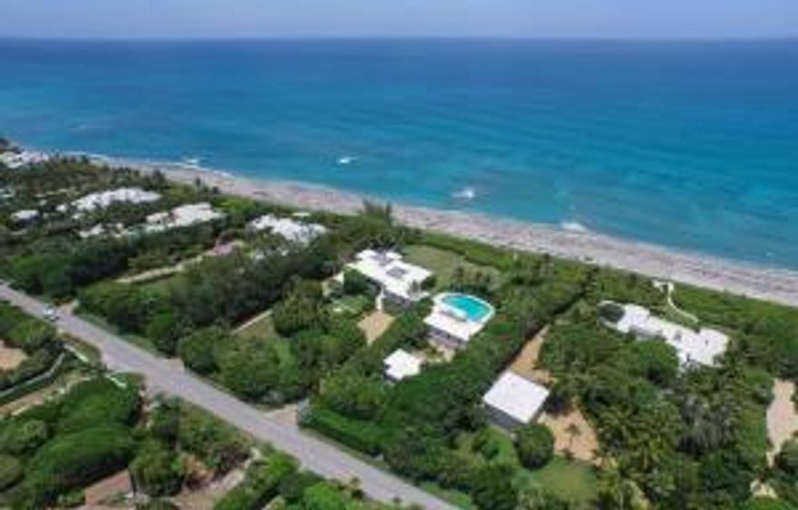 An elegant home on a prime oceanfront lot, #245 SBR perfectly represents the Jupiter Island lifestyle.  The lot's width and depth +/- 241x402 ensure the ultimate in peace and privacy while also offering multiple options for landscape design.  The house is a true Bermuda plan and was designed to maximize views and ocean breezes at all angles.  Originally built in 1957 the home was lovingly updated, modernized and expanded in 2007.  There are wonderful spaces throughout the home for entertaining, private ref