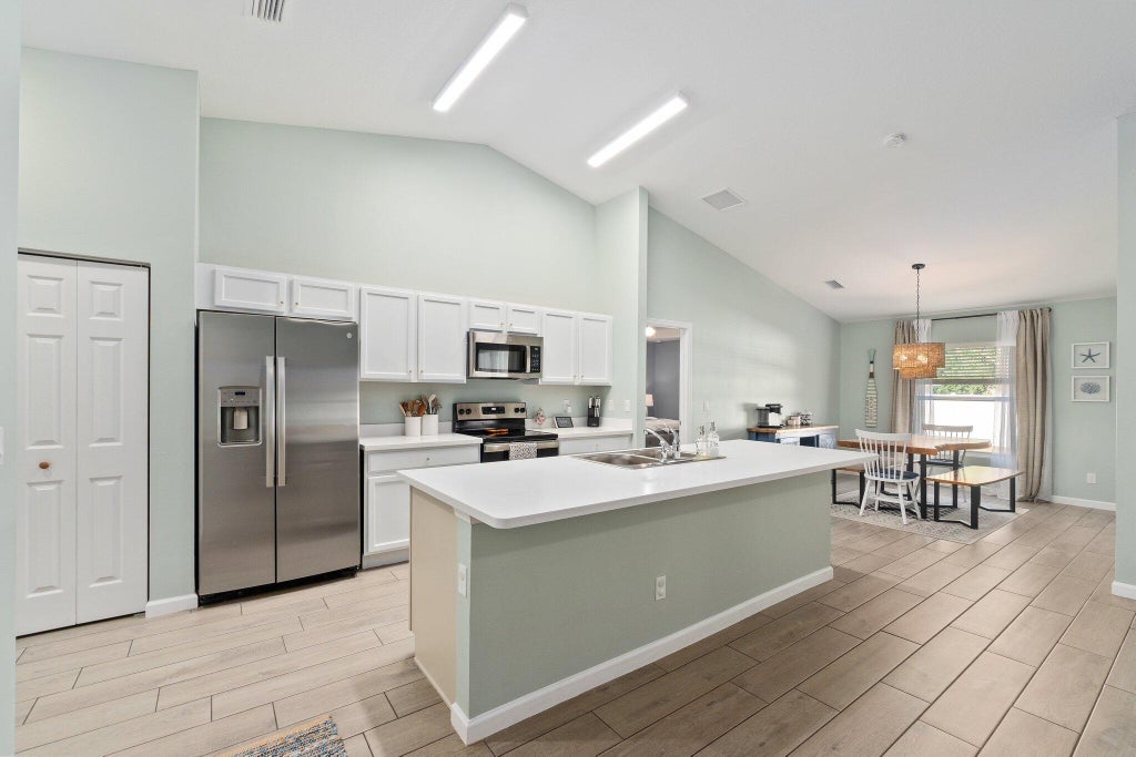 Photo of 1697 SW Day Street, Port Saint Lucie, FL 34953 (MLS # R10981650)
