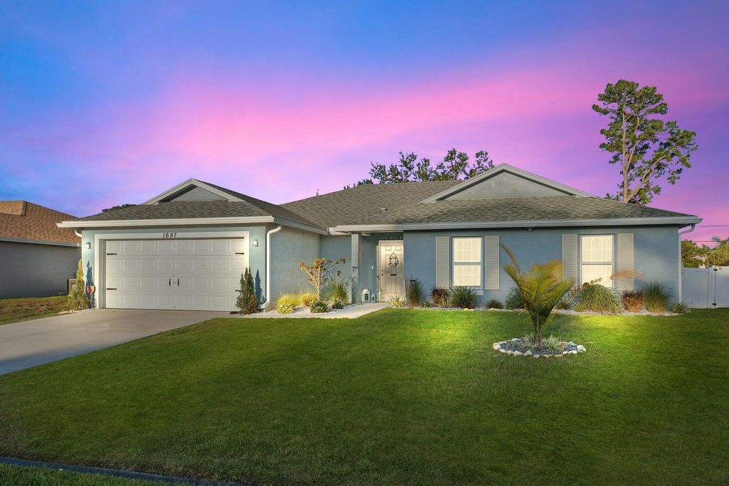 Photo of 1697 SW Day Street, Port Saint Lucie, FL 34953 (MLS # R10981650)