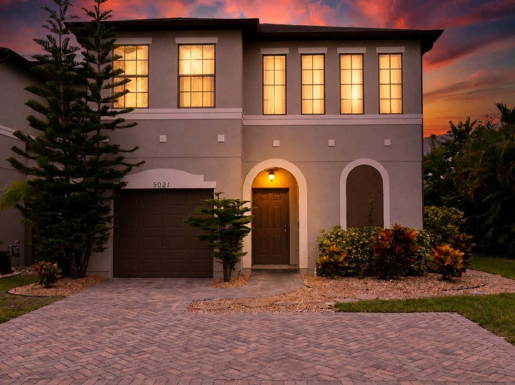 Photo of 5021 NW Coventry Circle, Port Saint Lucie, FL 34986 (MLS # B26047422)
