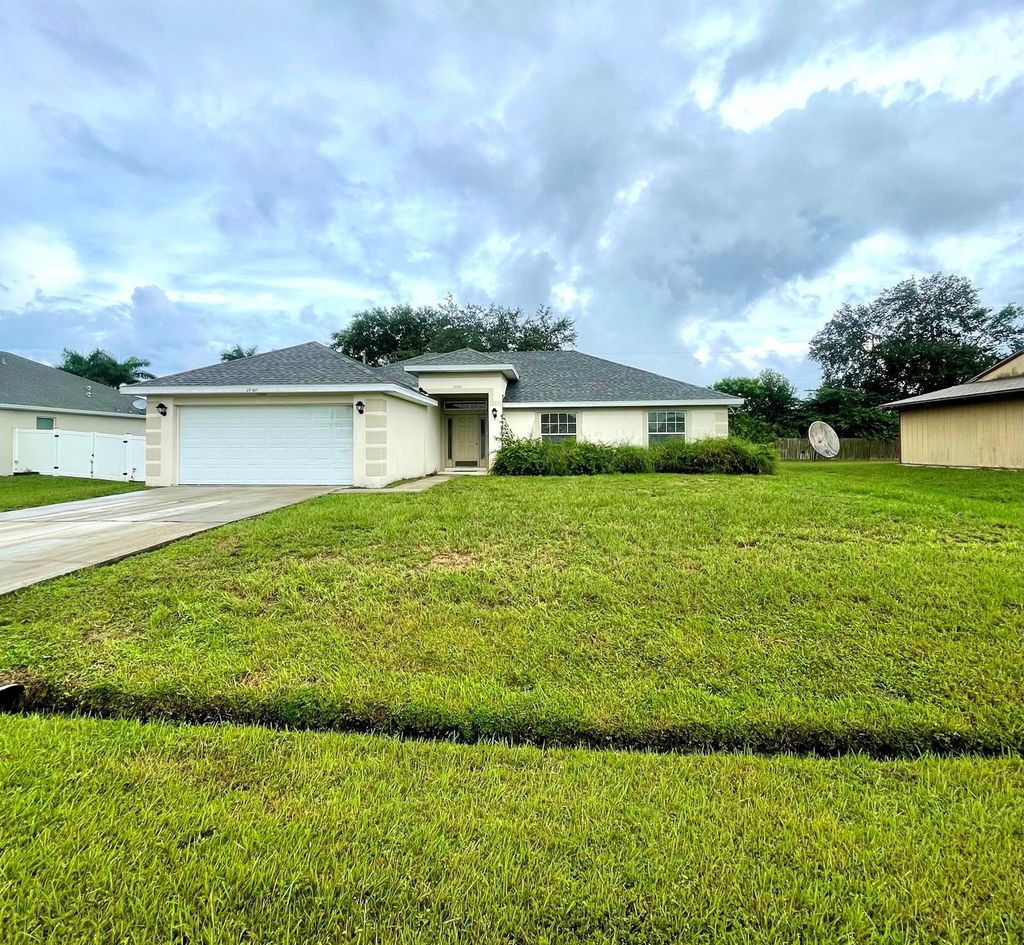 Photo of 1949 SW Beekman Street, Port Saint Lucie, FL 34953 (MLS # R11007302)