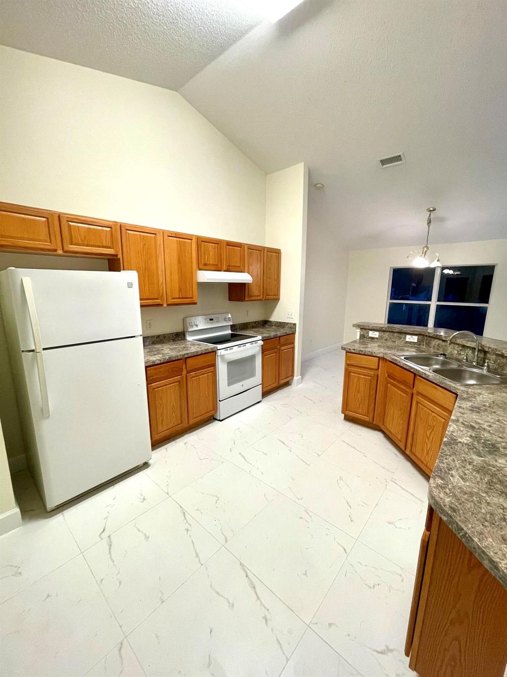 Photo of 1949 SW Beekman Street, Port Saint Lucie, FL 34953 (MLS # R11007302)