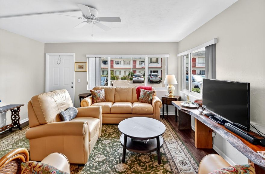 Sophisticated 1 bedrm unit in well maintained/financially stable 55+ complex located 8 min from ocean/across from 750-acre John Prince Park. You will love the Lake Osborne lifestyle. Walking/biking trails across the street. Lake view from living room's 2 windows. Assigned parking space & guest spot in front of unit. Gorgeous bamboo flooring. Beautiful leather furniture. Custom all-wood kitchen design. Great natural light! Tranquil bedroom w/private backyard. Complex is 2 min to 95 freeway/Tri-rail station. 5 min to dwntwn Lake Worth Beach. 15 min to WPB & Delray Beach for their abundant restaurants/shopping. Amenities galore: gigantic pool, 2 gyms, pickleball, bocce ball, shuffleboard, BBQ area, library, auditorium showing movies on Saturdays! Impact glass. Newer AC/water heater. Call now
