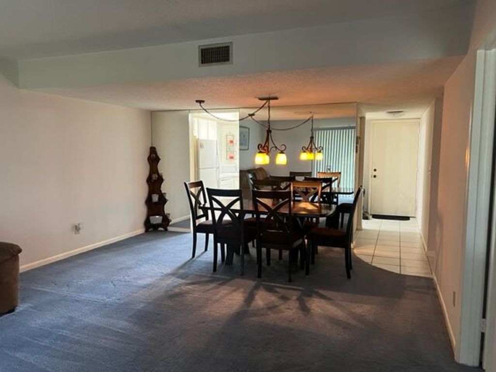 Photo of 18081 SE Country Club Drive #104, Jupiter, FL 33469 (MLS # R10919526)