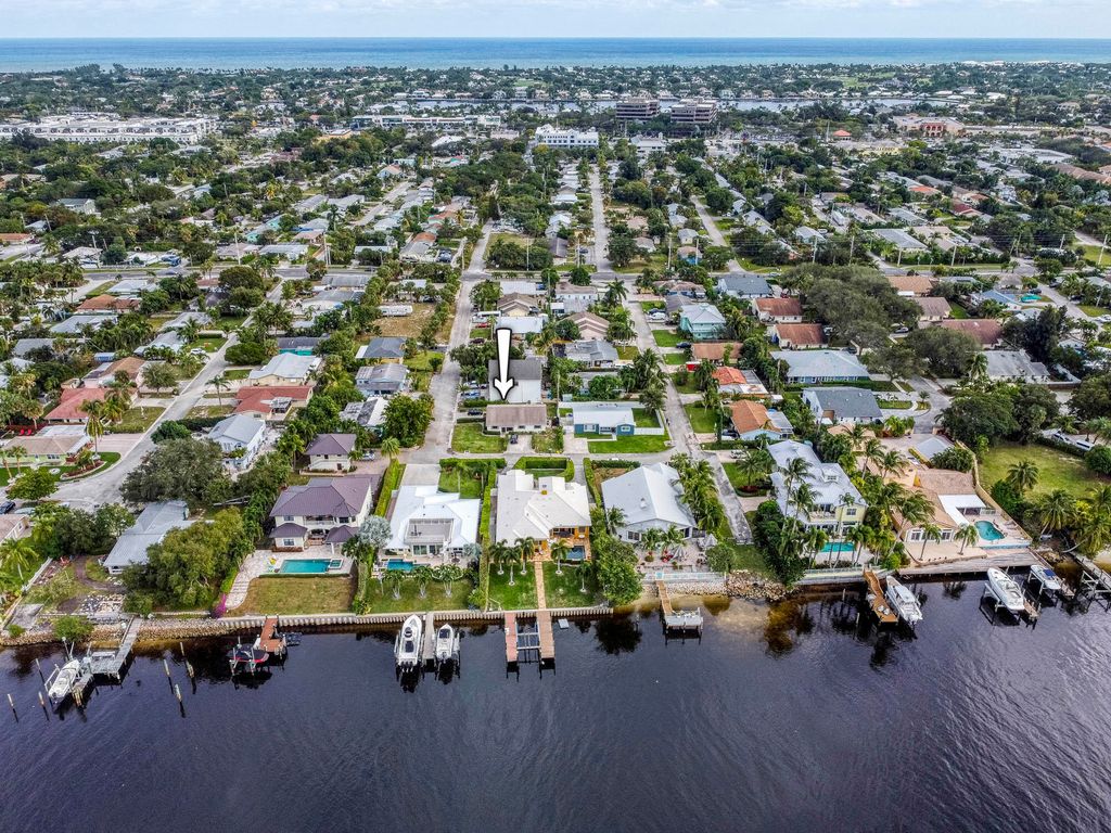 Photo of 2090 N Suzanne Circle, North Palm Beach, FL 33408 (MLS # R10854105)