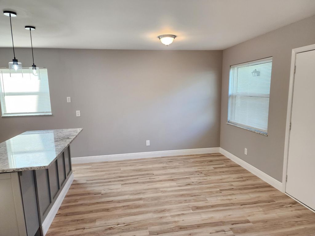 Photo of 10 Lake Vista Trail #105, Port Saint Lucie, FL 34952 (MLS # B26041897)