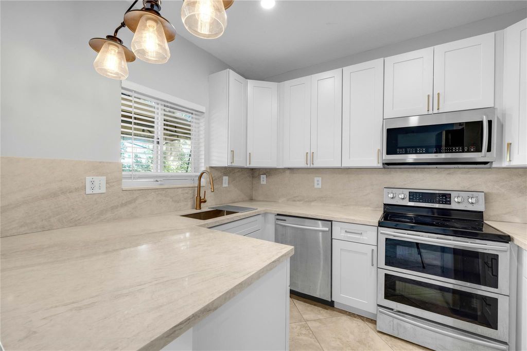 Photo of 8464 Lagos De Campo Boulevard, Tamarac, FL 33321 (MLS # F10537819)