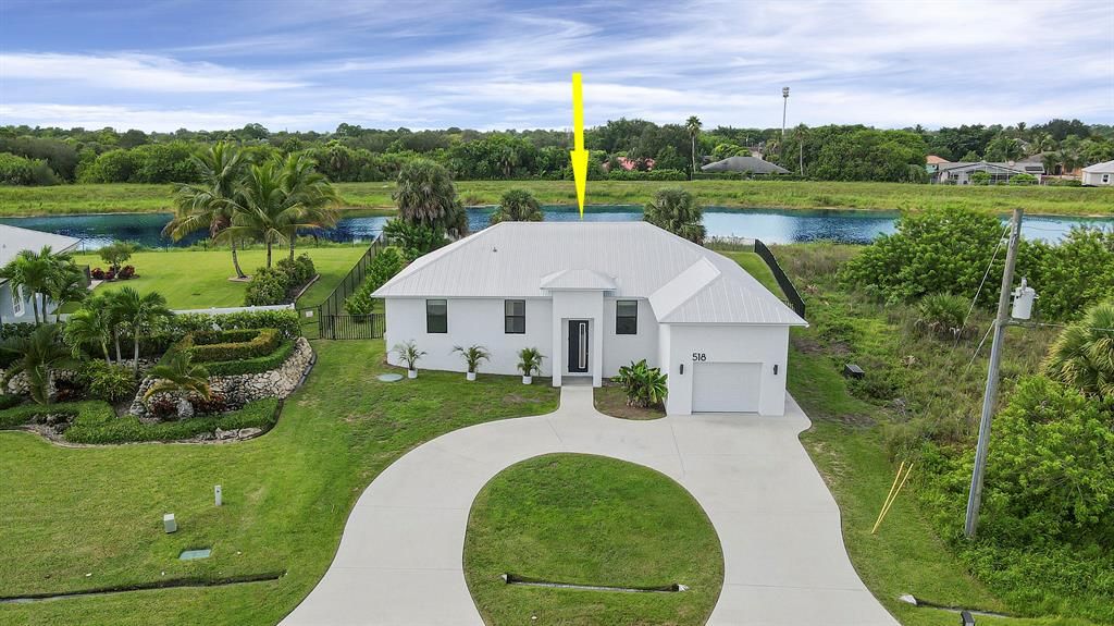 Photo of 518 SW Aster Road, Port Saint Lucie, FL 34953 (MLS # R10862108)