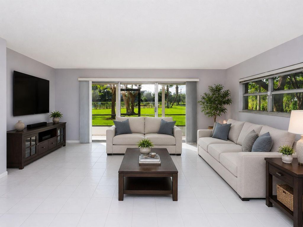 Photo of 550 SW 137 Avenue #L114, Pembroke Pines, FL 33027 (MLS # B26049314)